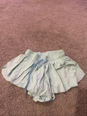 Amazon Light Mint Ruffle Athletic Skort with Blue Drawstring